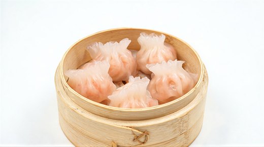 A steamer basket of dumplings