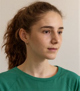 Portrait of a young woman in green