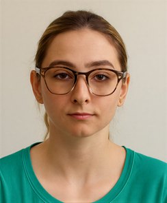 Portrait of a young woman with glasses